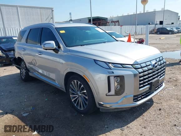 2023 Hyundai Palisade Calligraphy z VIN KM8R7DGE5PU572692, wystawiony jako IAAI lot #43012185 z przebiegiem 32 616 mil mil oraz . Historia ofert i sprzedaży dostępna na DreamBid. Obrazek 1.