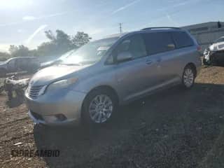 2011 Toyota Sienna XLE z VIN 5TDDK3DCXBS012335, wystawiony jako Copart lot #70504025 z przebiegiem 215 782 mil mil oraz Szkoda całkowita • Salvage title. Historia ofert i sprzedaży dostępna na DreamBid. Obrazek 1.