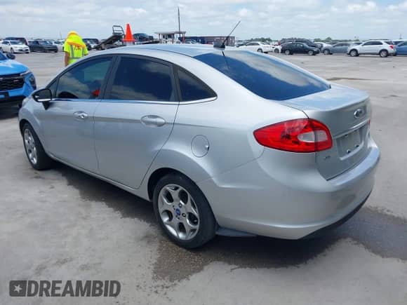 2012 Ford Fiesta SEL with VIN 3FADP4CJ9CM172768, listed as a IAAI auction lot 42506003 with 108,829 mi miles and . Bid and sale history available at DreamBid. Image 3.