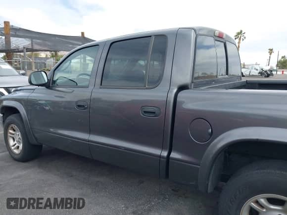 2003 Dodge Dakota SLT with VIN 1D7HL48N93S190381, listed as a IAAI auction lot 41921335 with 75,088 mi miles and . Bid and sale history available at DreamBid. Image 6.