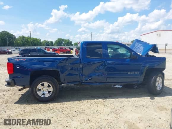 2015 Chevrolet Silverado 1500 LT z VIN 1GCVKREH7FZ251184, wystawiony jako IAAI lot #42564447 z przebiegiem Nie podano mil oraz . Historia ofert i sprzedaży dostępna na DreamBid. Obrazek 13.
