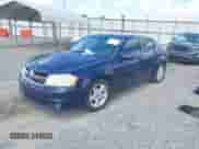 2013 Dodge Avenger SXT with VIN 1C3CDZCBXDN615817, listed as a IAAI auction lot 43282287 with 245,259 mi miles and . Bid and sale history available at DreamBid. Image 17.