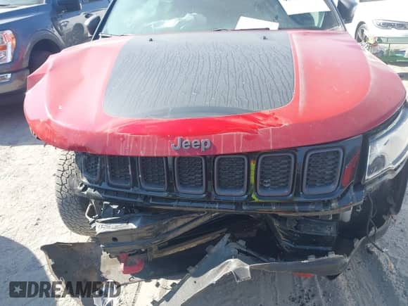 2020 Jeep Compass Trailhawk z VIN 3C4NJDDB8LT143999, wystawiony jako IAAI lot #43169195 z przebiegiem 68 923 mil mil oraz . Historia ofert i sprzedaży dostępna na DreamBid. Obrazek 6.