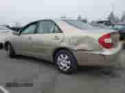2004 Toyota Camry LE с VIN JTDBE32K540245988, выставлен на аукционе Copart как лот 85377585 с пробегом 137 147 миль миль и Списание • Salvage title. История ставок и продаж доступна на DreamBid. Изображение 2.