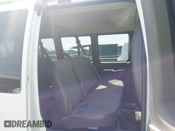 2014 Chevrolet Express Passenger LT with VIN 1GAZG1FG7E1116223, listed as a IAAI auction lot 42600132 with 297,913 mi miles and . Bid and sale history available at DreamBid. Image 8.
