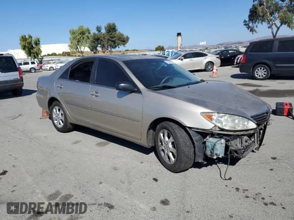 2005 Toyota Camry LE с VIN JTDBF32K750162836, выставлен на аукционе Copart как лот 81082105 с пробегом 131 582 миль миль и Списание • Salvage title. История ставок и продаж доступна на DreamBid. Изображение 4.