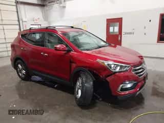 2018 Hyundai Santa Fe 2.4L z VIN 5XYZUDLBXJG504664, wystawiony jako IAAI lot #43331363 z przebiegiem 94 192 mil mil oraz . Historia ofert i sprzedaży dostępna na DreamBid. Obrazek 1.