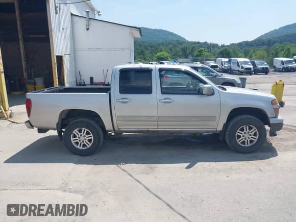 2010 Chevrolet Colorado 1LT z VIN 1GCJTCDE4A8135830, wystawiony jako IAAI lot #42827365 z przebiegiem 159 049 mil mil oraz . Historia ofert i sprzedaży dostępna na DreamBid. Obrazek 13.