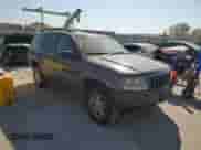 2004 Jeep Grand Cherokee Laredo with VIN 1J4GW48S84C348685, listed as a Copart auction lot 85169715 with 204,660 mi miles and Salvage title. Bid and sale history available at DreamBid. Image 4.