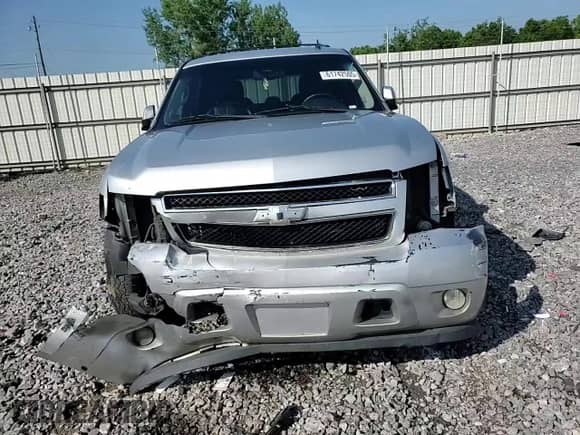 2012 Chevrolet Tahoe LT with VIN 1GNSCBE00CR267327, listed as a Copart auction lot 61742505 with 402,729 mi miles and Salvage title. Bid and sale history available at DreamBid. Image 14.