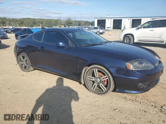 2005 Hyundai Tiburon GT with VIN KMHHN65F85U158764, listed as a Copart auction lot 80060884 with 121,747 mi miles and Clean title. Bid and sale history available at DreamBid. Image 4.