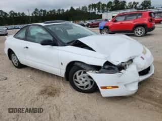 2000 Saturn SC with VIN 1G8ZP1283YZ160659, listed as a Copart auction lot 80305285 with Not provided miles and Clean title. Bid and sale history available at DreamBid. Image 4.