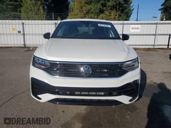 2024 Volkswagen Tiguan SE R-Line Black с VIN 3VV8B7AX4RM230248, выставлен на аукционе Copart как лот 80730345 с пробегом 6 879 миль миль и Списание • Salvage title. История ставок и продаж доступна на DreamBid. Изображение 5.