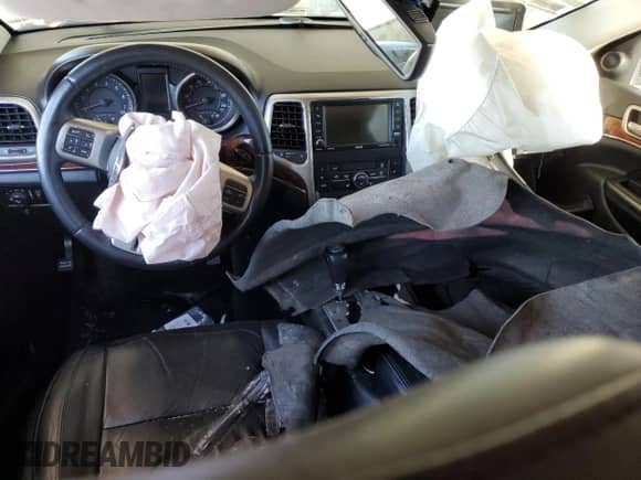 2013 Jeep Grand Cherokee Limited с VIN 1C4RJEBG2DC656944, выставлен на аукционе Copart как лот 82191405 с пробегом Не указан миль и Списание • Salvage title. История ставок и продаж доступна на DreamBid. Изображение 8.