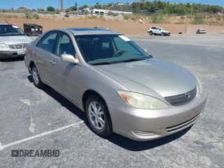 2004 Toyota Camry LE z VIN 4T1BF32K74U067244, wystawiony jako IAAI lot #43162095 z przebiegiem 370 818 mil mil oraz . Historia ofert i sprzedaży dostępna na DreamBid. Obrazek 1.