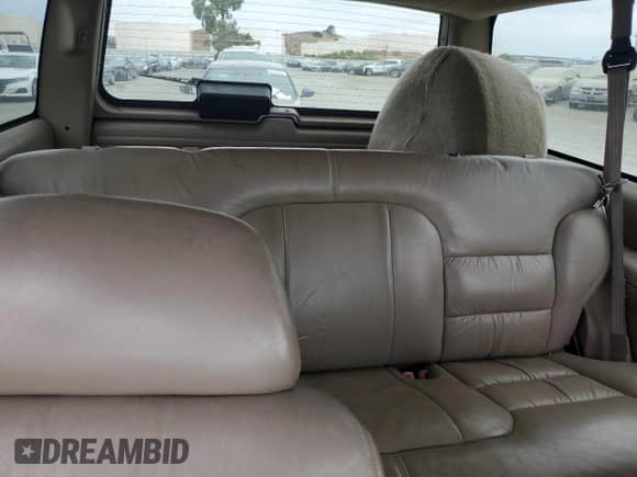 1999 Chevrolet Tahoe с VIN 3GNEK18R0XG116269, выставлен на аукционе Copart как лот 83964325 с пробегом 184 064 миль миль и Списание • Salvage title. История ставок и продаж доступна на DreamBid. Изображение 10.