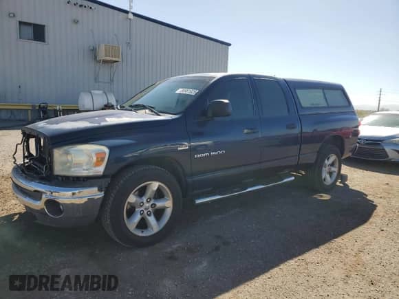 2007 Dodge 1500 SLT with VIN 1D7HA18297J588129, listed as a Copart auction lot 86981925 with 215,816 mi miles and Salvage title. Bid and sale history available at DreamBid. Image 1.