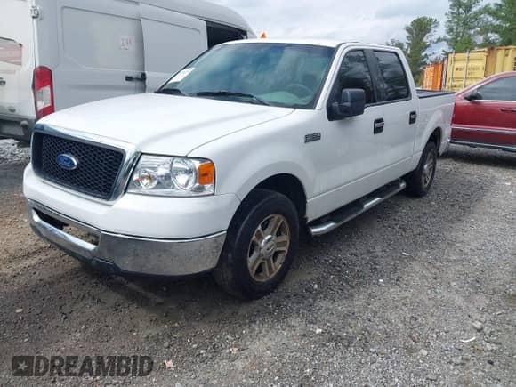 2007 Ford F-150 XLT with VIN 1FTRW12W97KA45353, listed as a IAAI auction lot 43070079 with 291,301 mi miles and . Bid and sale history available at DreamBid. Image 2.