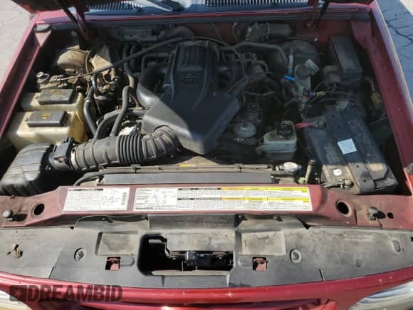 2000 Ford Explorer Sport with VIN 1FMYU60EXYUA76489, listed as a Copart auction lot 66216875 with 133,543 mi miles and Salvage title. Bid and sale history available at DreamBid. Image 12.