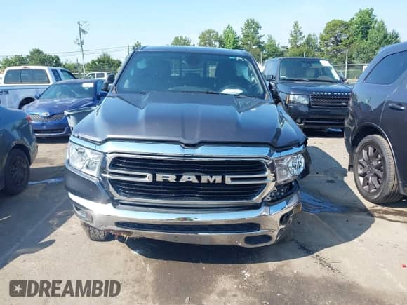 2019 Ram 1500 Big Horn with VIN 1C6SRFBT0KN834601, listed as a IAAI auction lot 42595918 with 118,351 mi miles and . Bid and sale history available at DreamBid. Image 12.