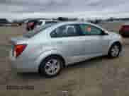 2012 Chevrolet Sonic LS with VIN 1G1JB5SHXC4152839, listed as a Copart auction lot 84397384 with 132,162 mi miles and Salvage title. Bid and sale history available at DreamBid. Image 3.