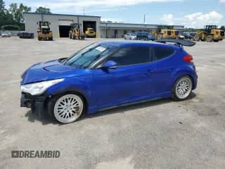 2014 Hyundai Veloster Turbo с VIN KMHTC6AE7EU205196, выставлен на аукционе Copart как лот 66582555 с пробегом Не указан миль и Списание • Salvage title. История ставок и продаж доступна на DreamBid. Изображение 1.