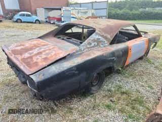 1969 Dodge Charger z VIN XP29H9B442352, wystawiony jako Copart lot #70062665 z przebiegiem Nie podano mil oraz Czysty tytuł • Clean title. Historia ofert i sprzedaży dostępna na DreamBid. Obrazek 4.