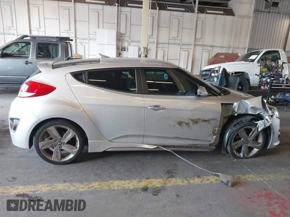 2013 Hyundai Veloster Turbo с VIN KMHTC6AEXDU145719, выставлен на аукционе IAAI как лот 43144474 с пробегом 51 191 миль миль и . История ставок и продаж доступна на DreamBid. Изображение 13.