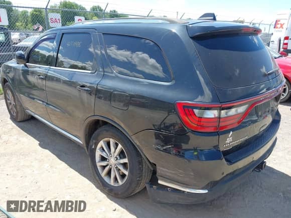 2014 Dodge Durango SXT with VIN 1C4RDJAG7EC561962, listed as a IAAI auction lot 42771485 with 179,140 mi miles and . Bid and sale history available at DreamBid. Image 3.