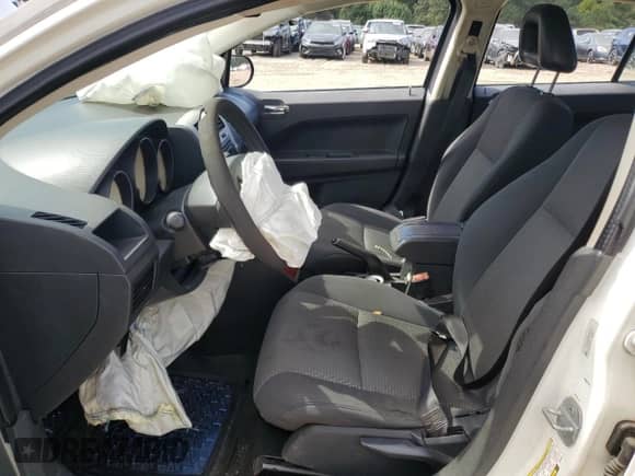 2008 Dodge Caliber SXT with VIN 1B3HB48BX8D786275, listed as a Copart auction lot 85390385 with 250,585 mi miles and Salvage title. Bid and sale history available at DreamBid. Image 7.