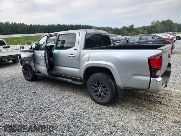 2022 Toyota Tacoma SR5 with VIN 3TMAZ5CN3NM194624, listed as a Copart auction lot 80702815 with 44,906 mi miles and Salvage title. Bid and sale history available at DreamBid. Image 2.