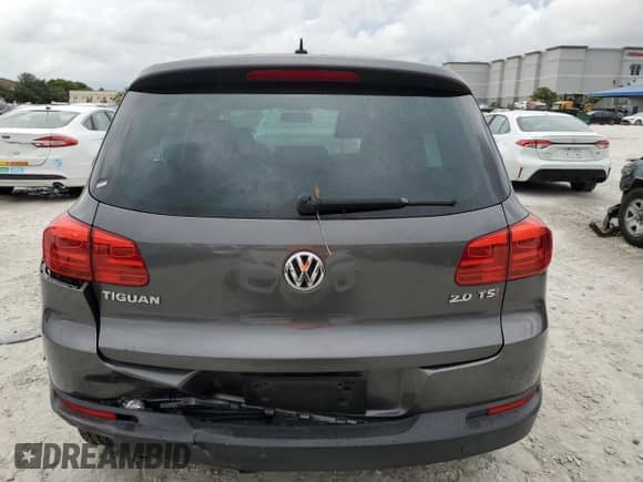 2013 Volkswagen Tiguan SE z VIN WVGAV3AX4DW581925, wystawiony jako Copart lot #55970105 z przebiegiem 115 504 mil mil oraz Czysty tytuł • Clean title. Historia ofert i sprzedaży dostępna na DreamBid. Obrazek 6.