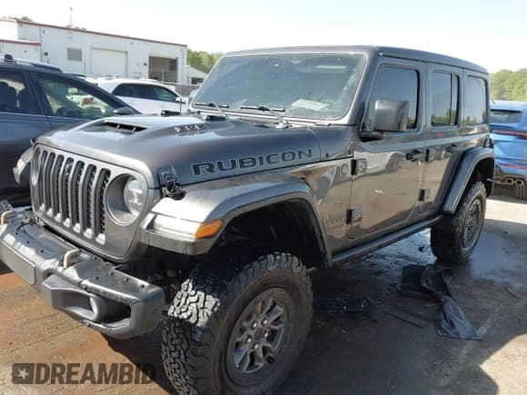 2022 Jeep Wrangler Unlimited Rubicon 392 с VIN 1C4JJXSJ6NW193565, выставлен на аукционе IAAI как лот 42050331 с пробегом 21 382 миль миль и . История ставок и продаж доступна на DreamBid. Изображение 2.