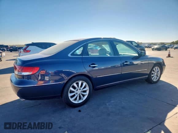 2006 Hyundai Azera SE с VIN KMHFC46F36A113380, выставлен на аукционе Copart как лот 90662845 с пробегом 106 432 миль миль и Чистый • Clean title. История ставок и продаж доступна на DreamBid. Изображение 3.