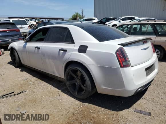 2014 Chrysler 300 SRT-8 with VIN 2C3CCAFJ9EH206886, listed as a Copart auction lot 87480784 with 121,327 mi miles and Salvage title. Bid and sale history available at DreamBid. Image 2.