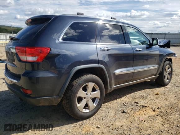 2013 Jeep Grand Cherokee Limited z VIN 1C4RJFBG6DC523884, wystawiony jako Copart lot #82273625 z przebiegiem Nie podano mil oraz Szkoda całkowita • Salvage title. Historia ofert i sprzedaży dostępna na DreamBid. Obrazek 3.
