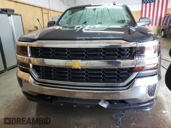 2018 Chevrolet Silverado 1500 LT с VIN 1GCVKREH3JZ188075, выставлен на аукционе Copart как лот 42830315 с пробегом 112 116 миль миль и Списание • Salvage title. История ставок и продаж доступна на DreamBid. Изображение 5.