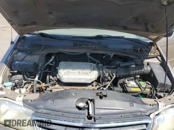 2004 Honda Odyssey LX with VIN 5FNRL18534B143388, listed as a Copart auction lot 68346135 with 160,563 mi miles and Salvage title. Bid and sale history available at DreamBid. Image 12.