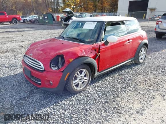 2013 MINI Hardtop with VIN WMWSU3C50DT690047, listed as a IAAI auction lot 43477533 with 93,857 mi miles and . Bid and sale history available at DreamBid. Image 2.