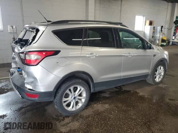2017 Ford Escape SE z VIN 1FMCU9G91HUE87820, wystawiony jako Copart lot #80785325 z przebiegiem 118 426 mil mil oraz Szkoda całkowita • Salvage title. Historia ofert i sprzedaży dostępna na DreamBid. Obrazek 3.