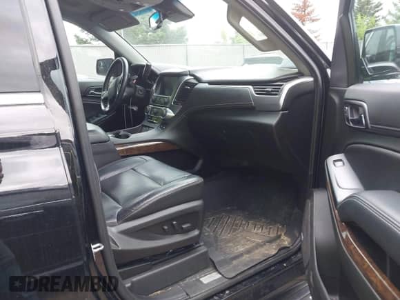2018 Chevrolet Tahoe LT z VIN 1GNSKBKC9JR254896, wystawiony jako IAAI lot #42456940 z przebiegiem 102 459 mil mil oraz . Historia ofert i sprzedaży dostępna na DreamBid. Obrazek 5.
