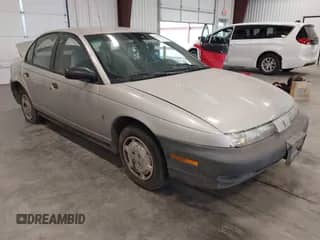 1999 Saturn SL with VIN 1G8ZF528XXZ362956, listed as a IAAI auction lot 42646763 with 201,548 mi miles and . Bid and sale history available at DreamBid. Image 1.