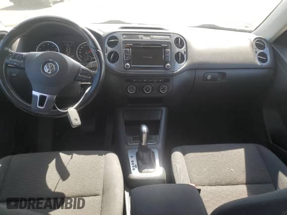 2015 Volkswagen Tiguan с VIN WVGHV7AXXFW534407, выставлен на аукционе Copart как лот 70363185 с пробегом 237 007 миль миль и Списание • Salvage title. История ставок и продаж доступна на DreamBid. Изображение 8.