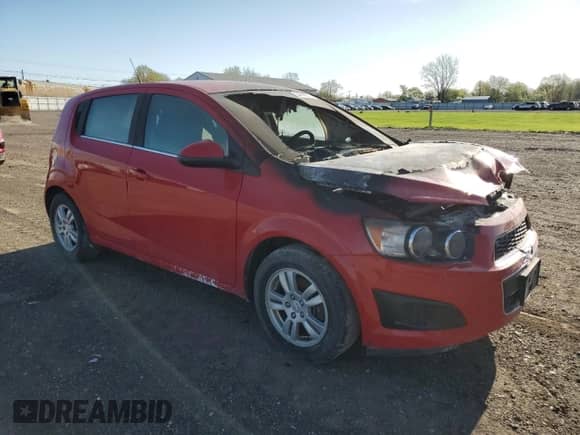 2012 Chevrolet Sonic LT with VIN 1G1JD6SB8C4201967, listed as a Copart auction lot 56232015 with Not provided miles and Salvage title. Bid and sale history available at DreamBid. Image 4.