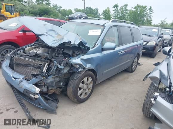 2007 Hyundai Entourage GLS with VIN KNDMC233676013319, listed as a IAAI auction lot 42663094 with 209,578 mi miles and . Bid and sale history available at DreamBid. Image 2.