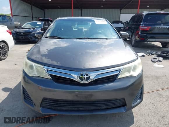 2014 Toyota Camry LE with VIN 4T1BF1FK0EU424330, listed as a IAAI auction lot 43042804 with 166,879 mi miles and . Bid and sale history available at DreamBid. Image 12.