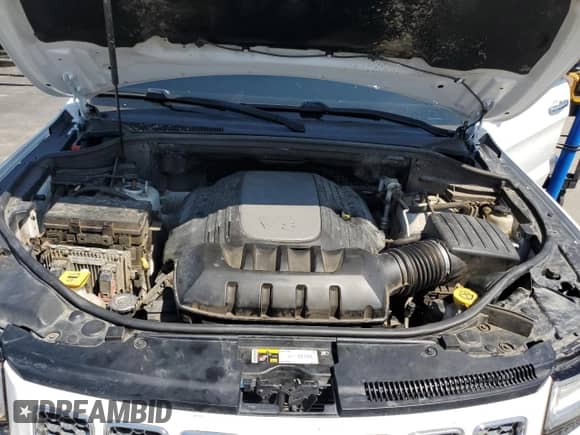 2014 Jeep Grand Cherokee Summit with VIN 1C4RJFJT4EC523334, listed as a Copart auction lot 70189445 with 85,386 mi miles and Salvage title. Bid and sale history available at DreamBid. Image 12.