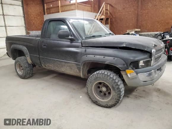 2001 Dodge 1500 with VIN 1B7HF16Y81S102138, listed as a Copart auction lot 63245715 with 132,888 mi miles and Salvage title. Bid and sale history available at DreamBid. Image 4.