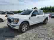 2023 Ford F-150 Lariat with VIN 1FTFW1E89PFA91516, listed as a Copart auction lot 61666315 with 65,711 mi miles and Salvage title. Bid and sale history available at DreamBid. Image 1.