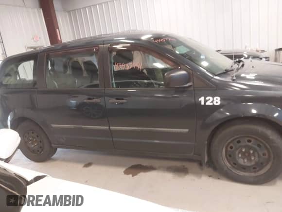 2014 Dodge Grand Caravan SE with VIN 2C4RDGBG7ER190715, listed as a IAAI auction lot 43437741 with 97,908 mi miles and . Bid and sale history available at DreamBid. Image 13.